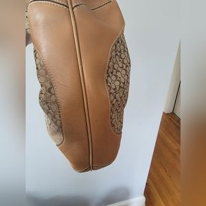 COACH SHOULDER BAG, NWOT, WITH A LIGHT PEN STAIN ON THE OUTSIDE BOTTOM.